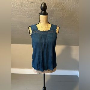 Maurice’s tank. Worn once. Great condition.